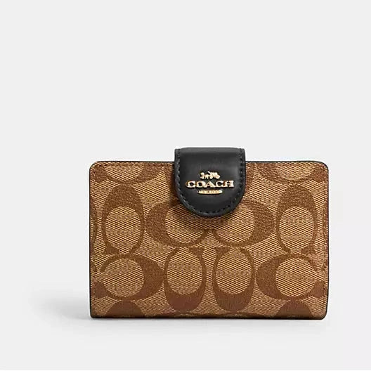 Cartera mediana con cremallera en las esquinas de Coach