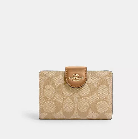 Cartera mediana con cremallera en las esquinas de Coach