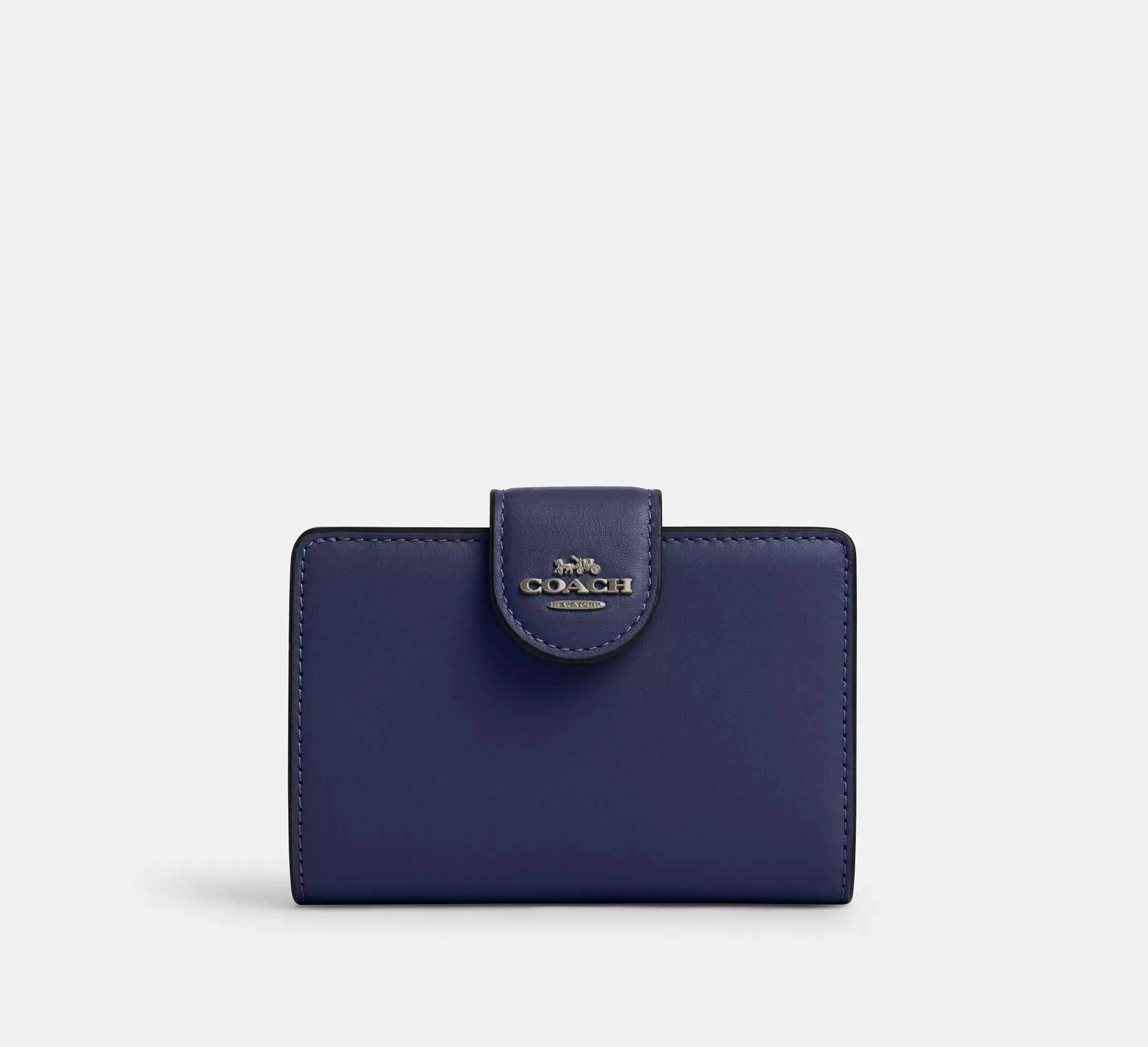 Cartera mediana con cremallera en las esquinas de Coach