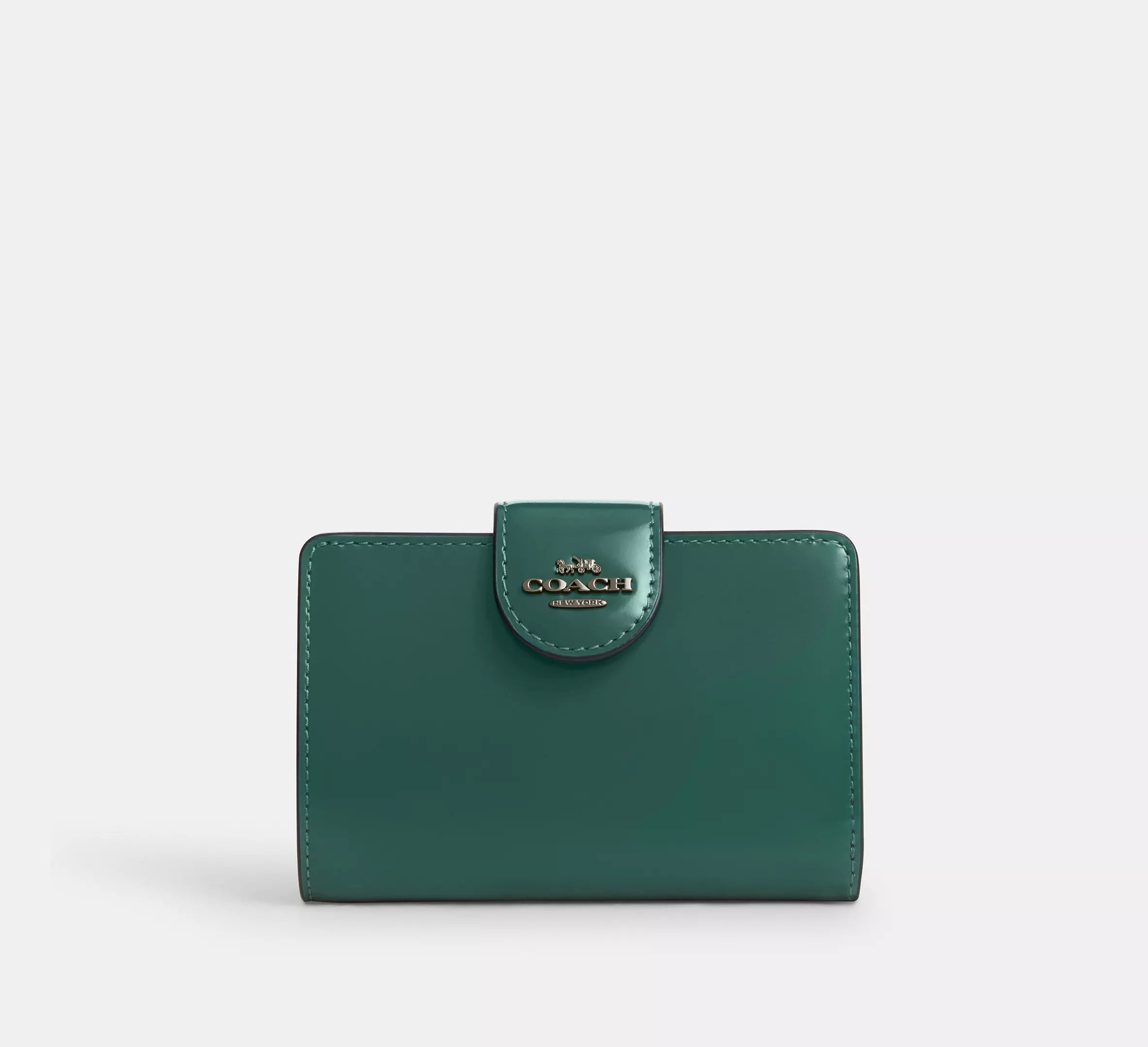 Cartera mediana con cremallera en las esquinas de Coach