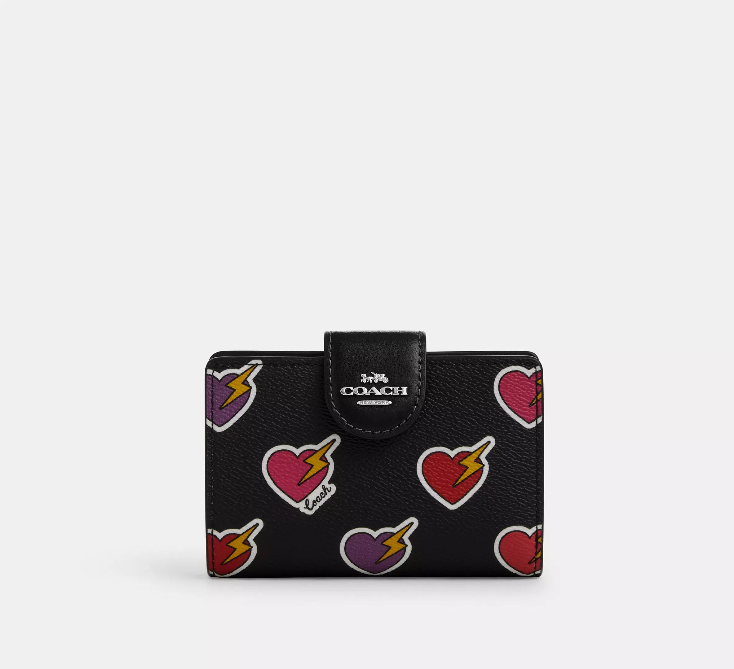 Cartera mediana con cremallera en las esquinas de Coach