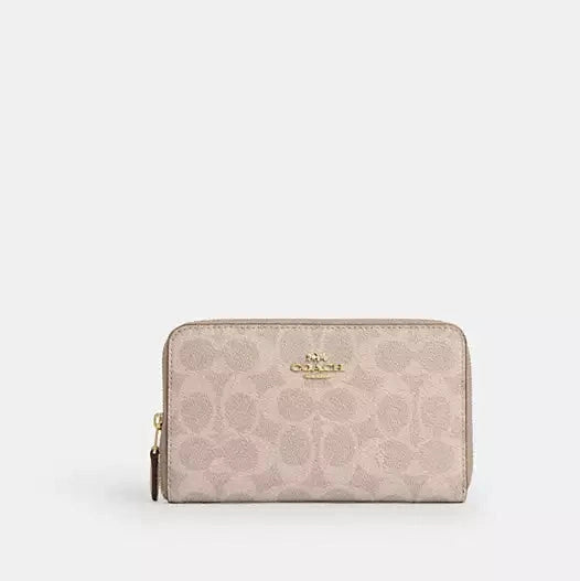 Cartera mediana con cremallera y portadocumentos Coach