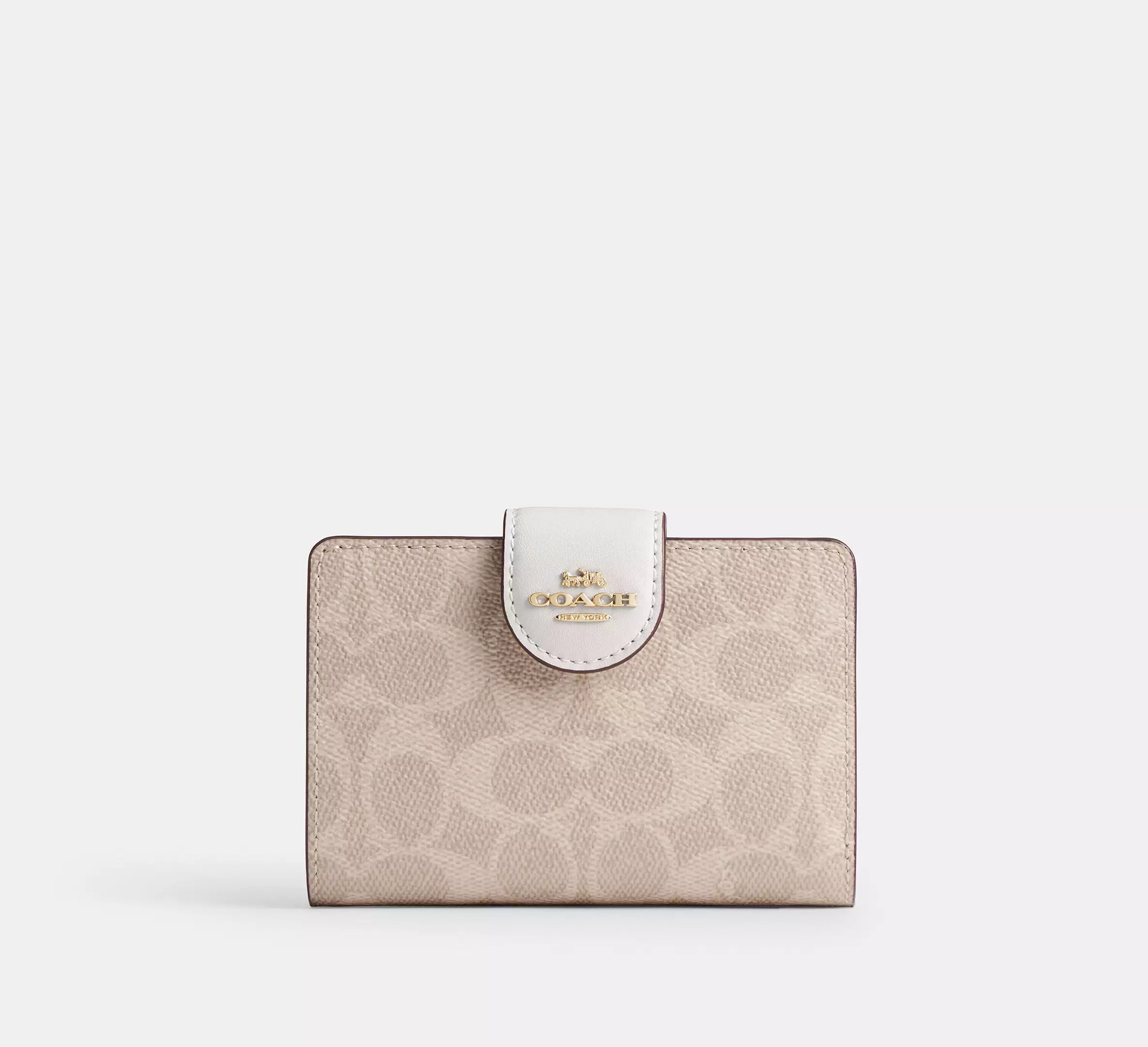 Cartera mediana con cremallera en las esquinas de Coach