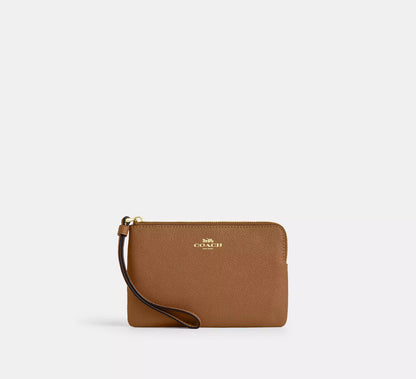 Coach Corner Zip Wristlet In Signature Canvas With Stripe