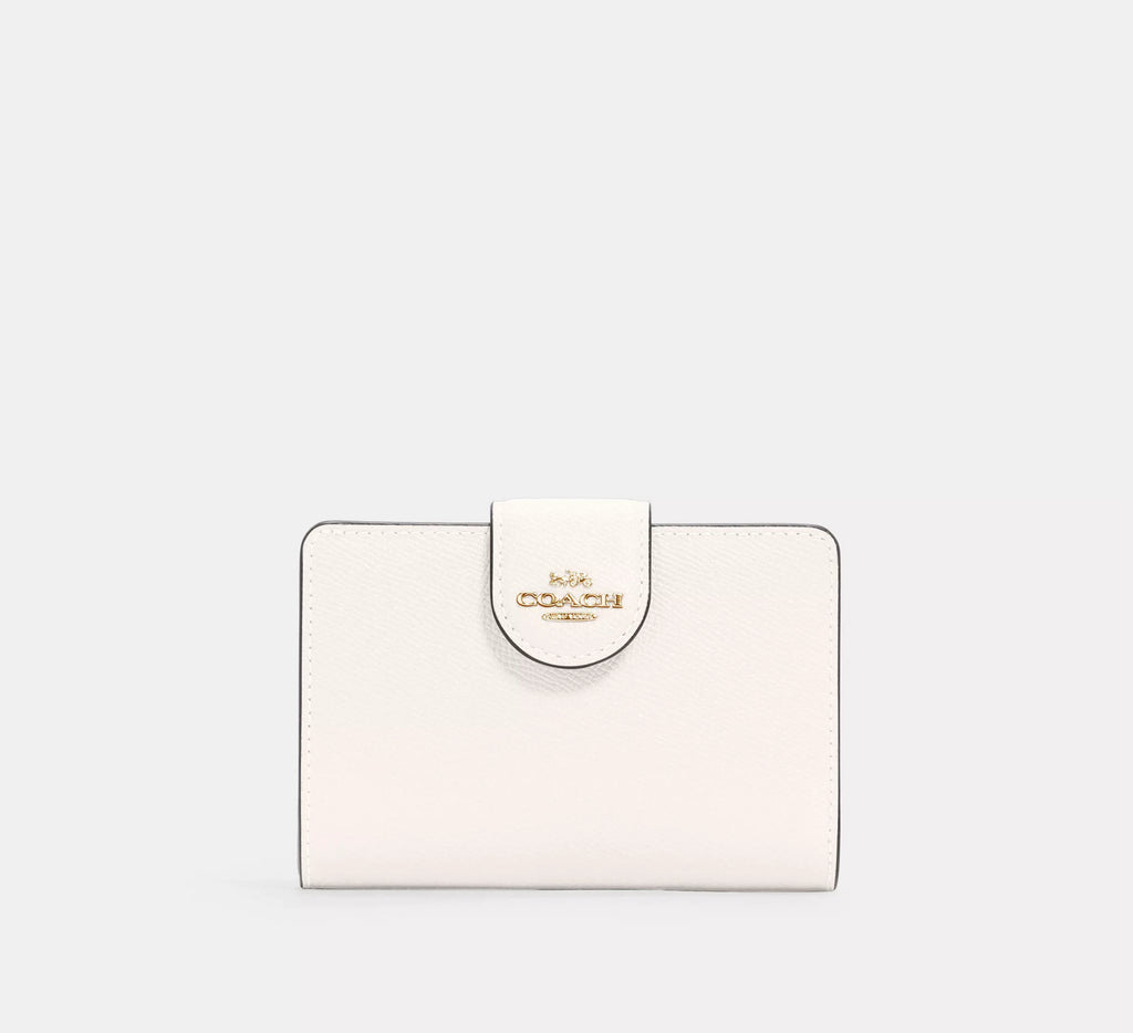 Cartera mediana con cremallera en las esquinas de Coach 