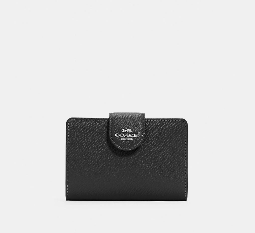 Cartera mediana con cremallera en las esquinas de Coach 