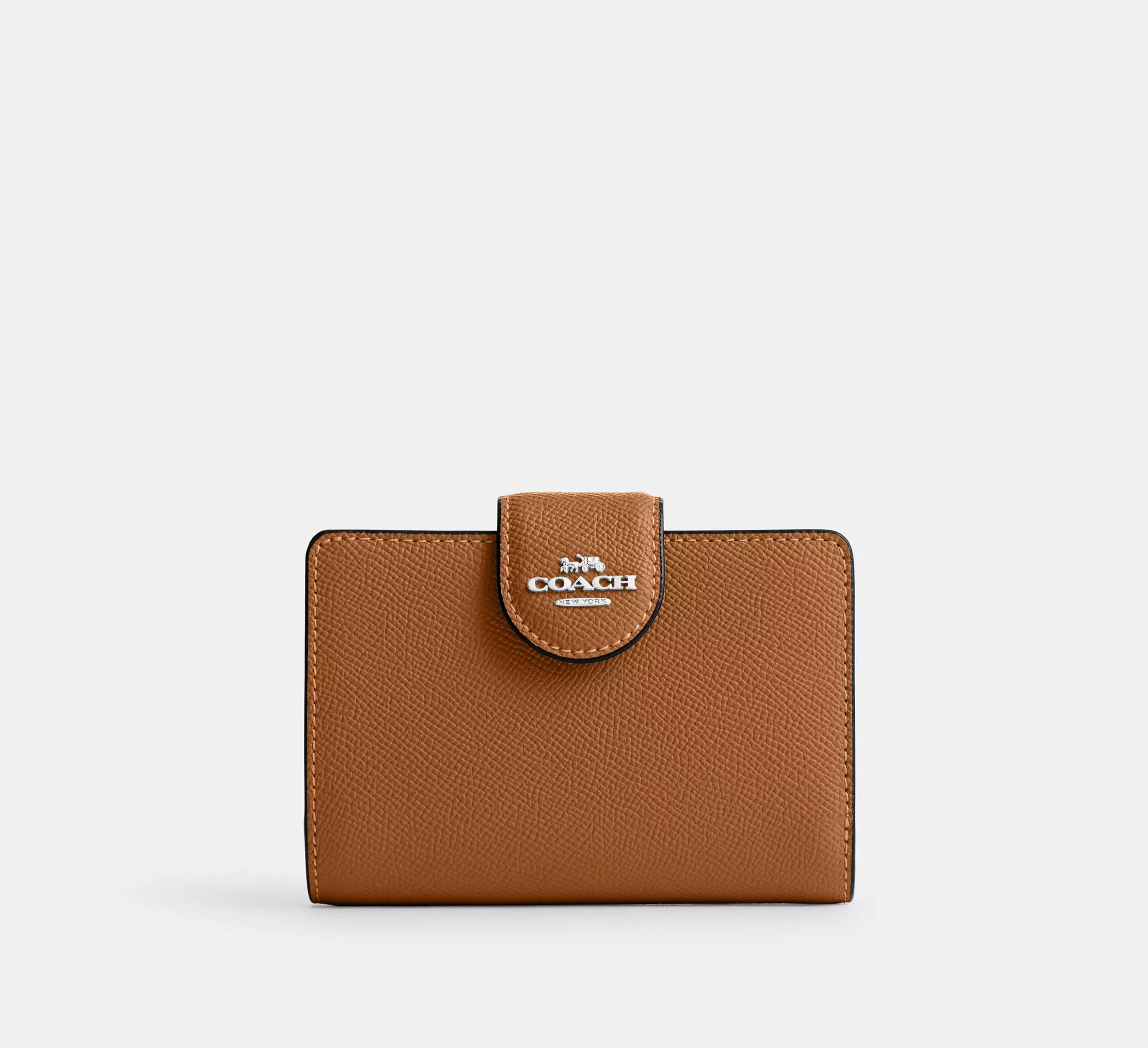 Cartera mediana con cremallera en las esquinas de Coach 