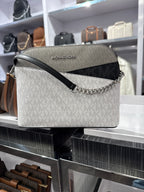 Bolso bandolera Jet Set Dome de Michael Kors