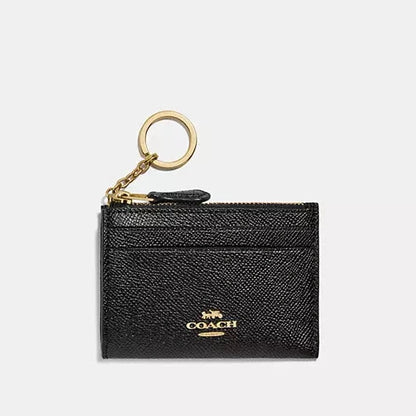 Estuche para identificación Coach Mini Skinny 