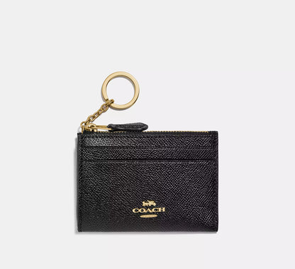 Estuche para identificación Coach Mini Skinny 