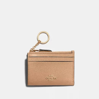 Estuche para identificación Coach Mini Skinny 