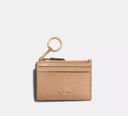 Estuche para identificación Coach Mini Skinny 