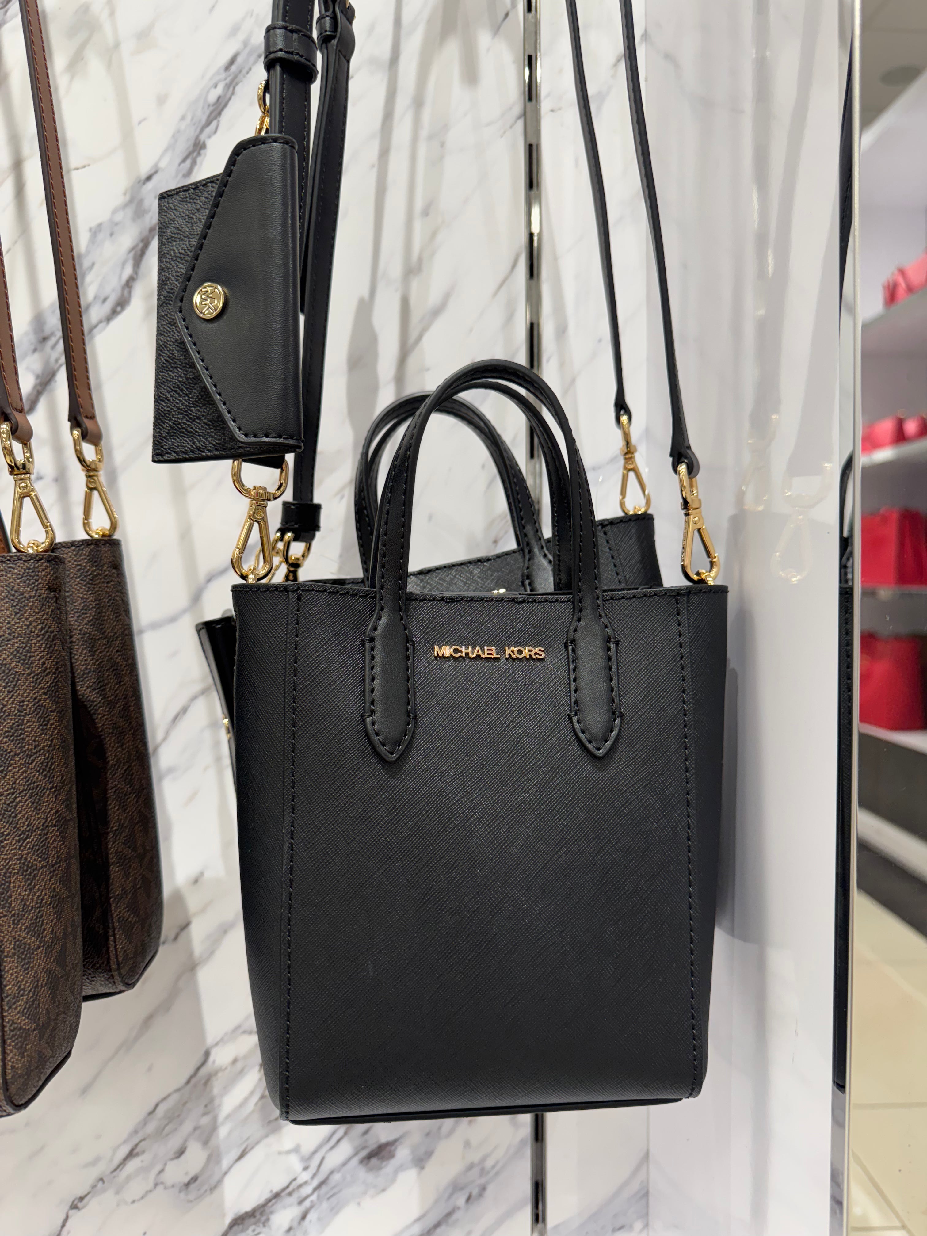 Bolso bandolera extrapequeño Vincent de Michael Kors con tarjetero y logotipo