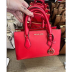 Bolso satchel pequeño de piel sintética Sheila de Michael Kors