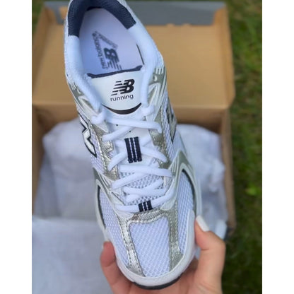 New Balance 530 trainers in white & natural indigo