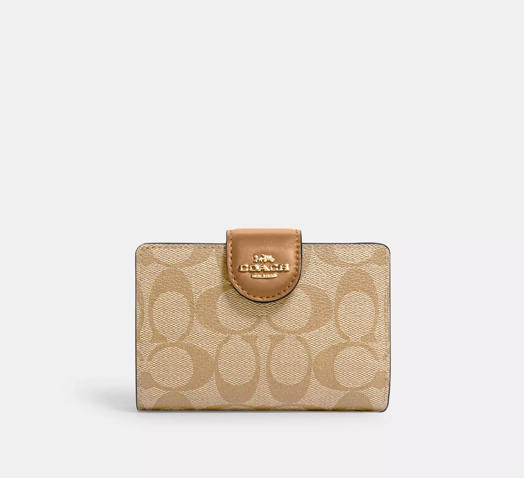 Cartera mediana con cremallera en las esquinas de Coach 
