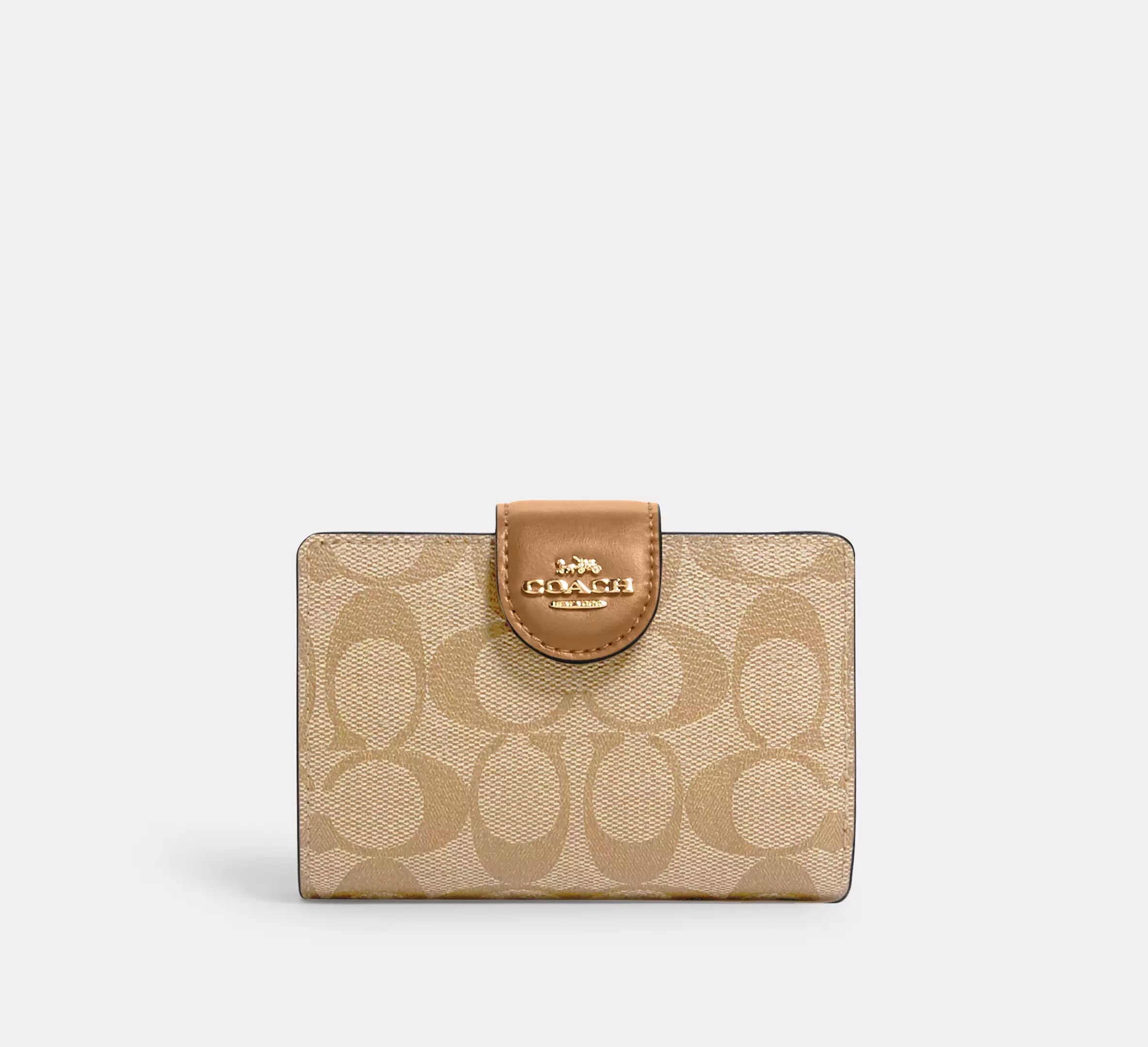 Cartera mediana con cremallera en las esquinas de Coach 