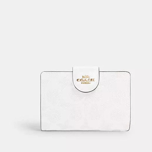 Cartera mediana con cremallera en las esquinas de Coach 