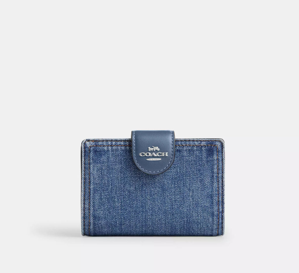 Cartera mediana con cremallera en las esquinas de Coach 