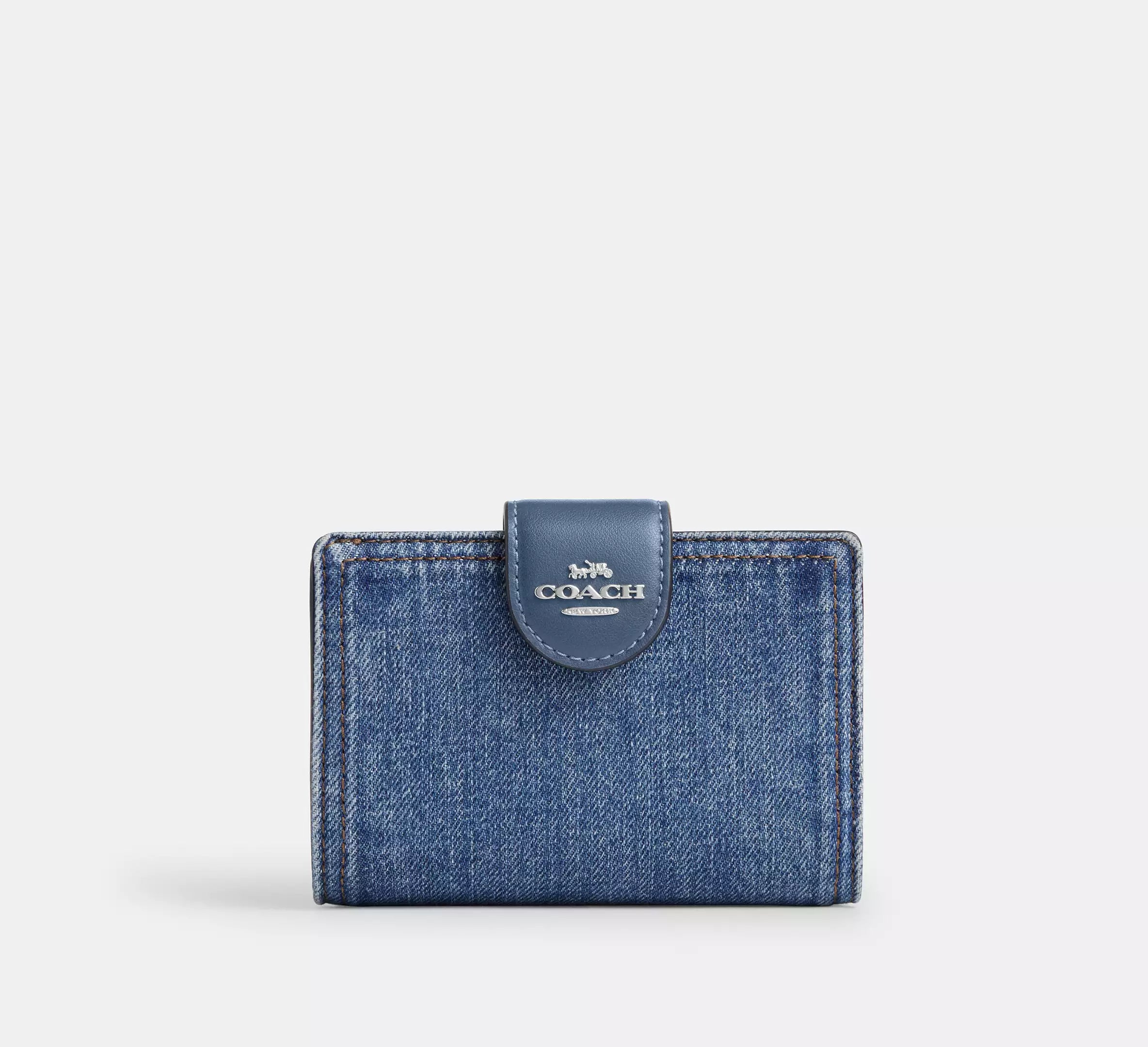 Cartera mediana con cremallera en las esquinas de Coach 