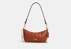 Coach Caitlin Shoulder Bag Quilted With Charm Gold/Cinnamon