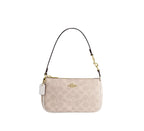 Coach Nolita 19 in Signature Canvas – Mini Clutch Bag