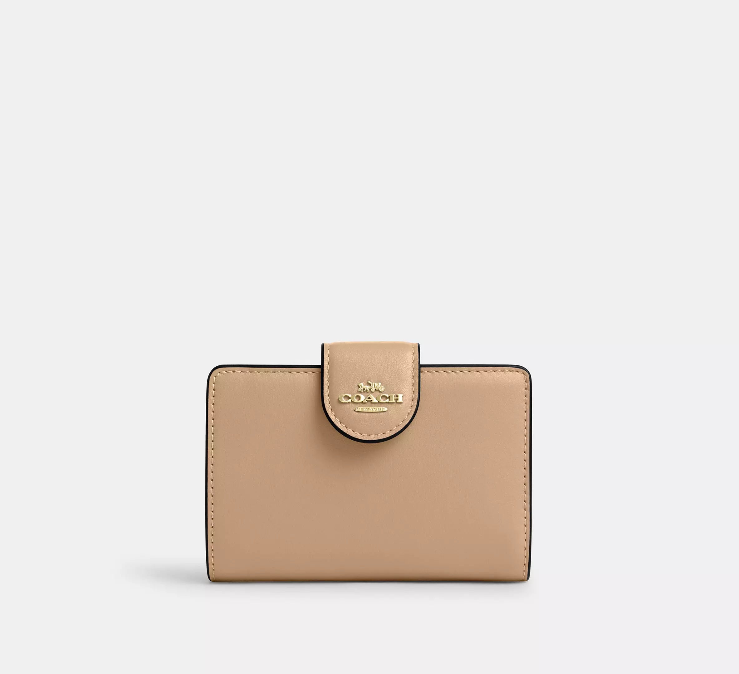 Cartera mediana con cremallera en las esquinas de Coach 