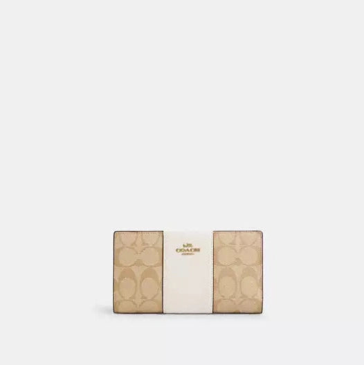 Cartera fina con cremallera de Coach en lona distintiva 