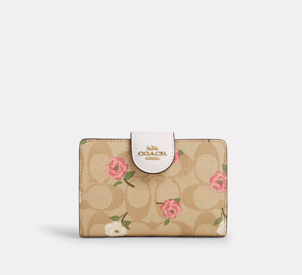 Cartera mediana con cremallera en las esquinas de Coach 