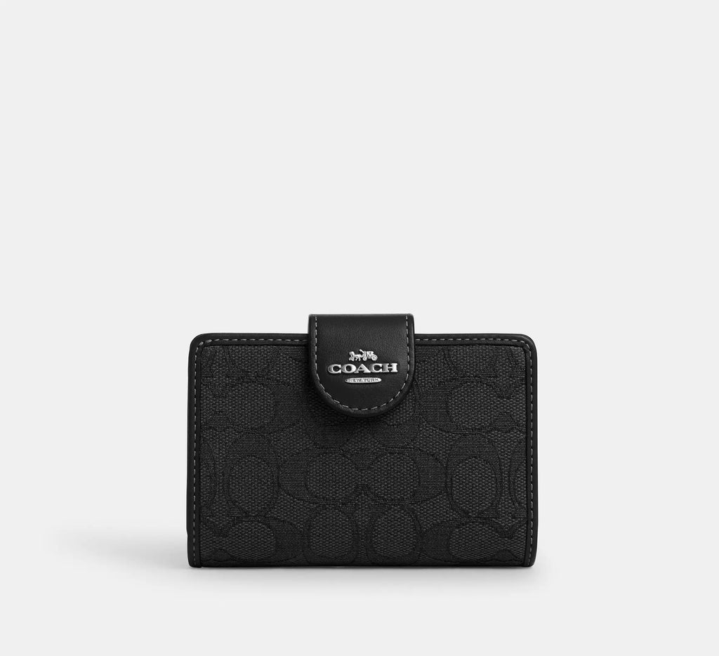 Cartera mediana con cremallera en las esquinas de Coach 