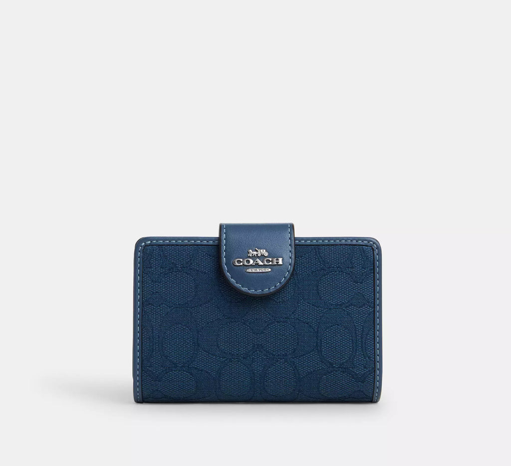 Cartera mediana con cremallera en las esquinas de Coach 