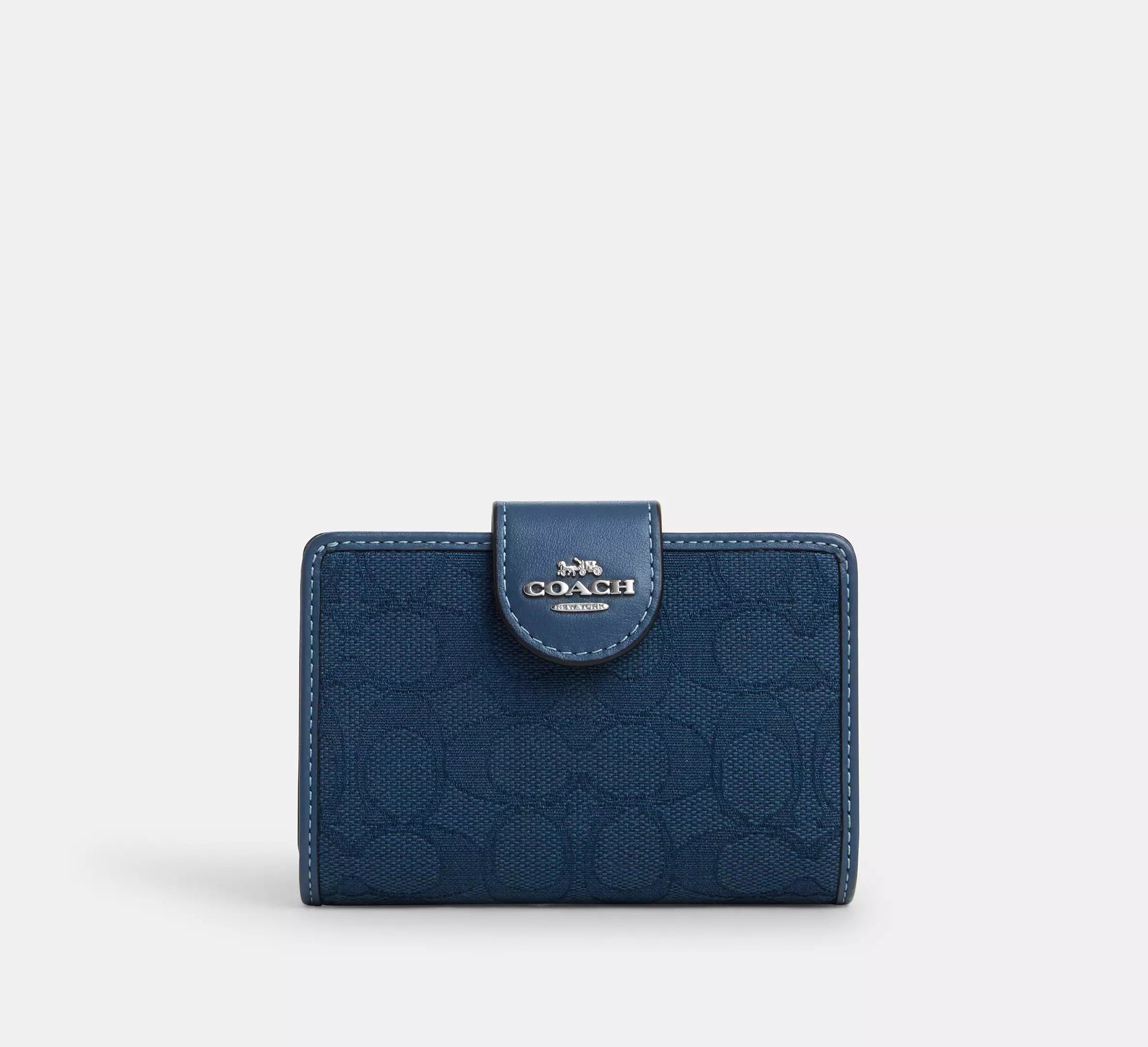 Cartera mediana con cremallera en las esquinas de Coach 