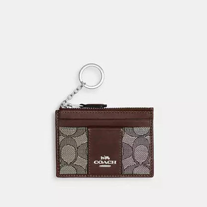 Estuche para identificación Coach Mini Skinny 