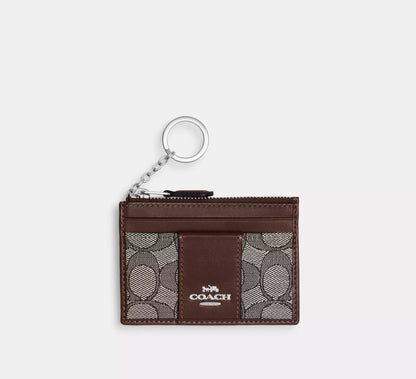 Estuche para identificación Coach Mini Skinny 