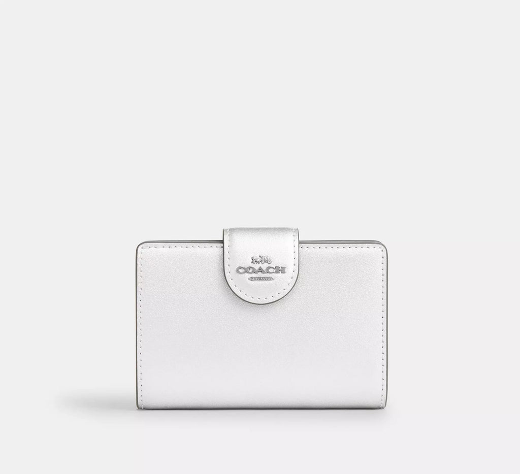 Cartera mediana con cremallera en las esquinas de Coach 