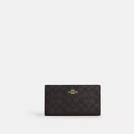 Cartera fina con cremallera de Coach en lona distintiva 
