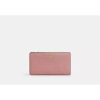Cartera fina con cremallera de Coach en lona distintiva 