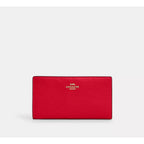 Cartera fina con cremallera de Coach en lona distintiva 