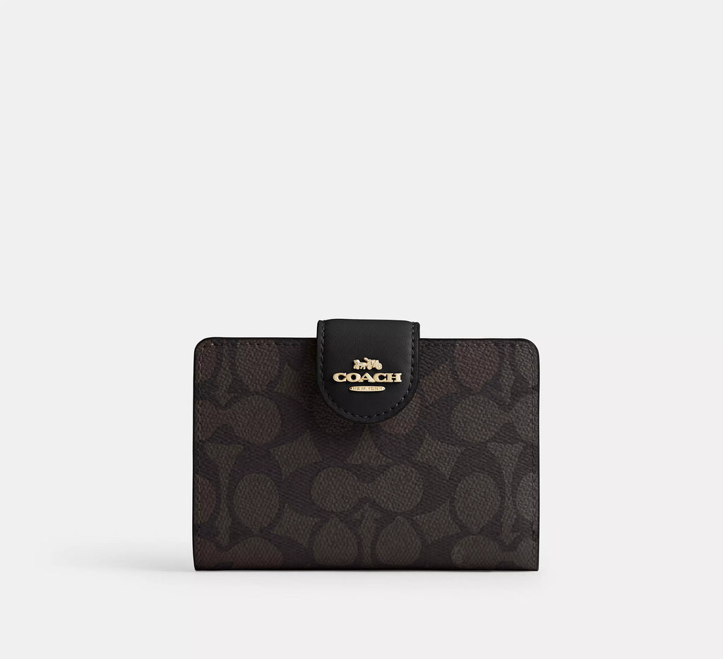Cartera mediana con cremallera en las esquinas de Coach 