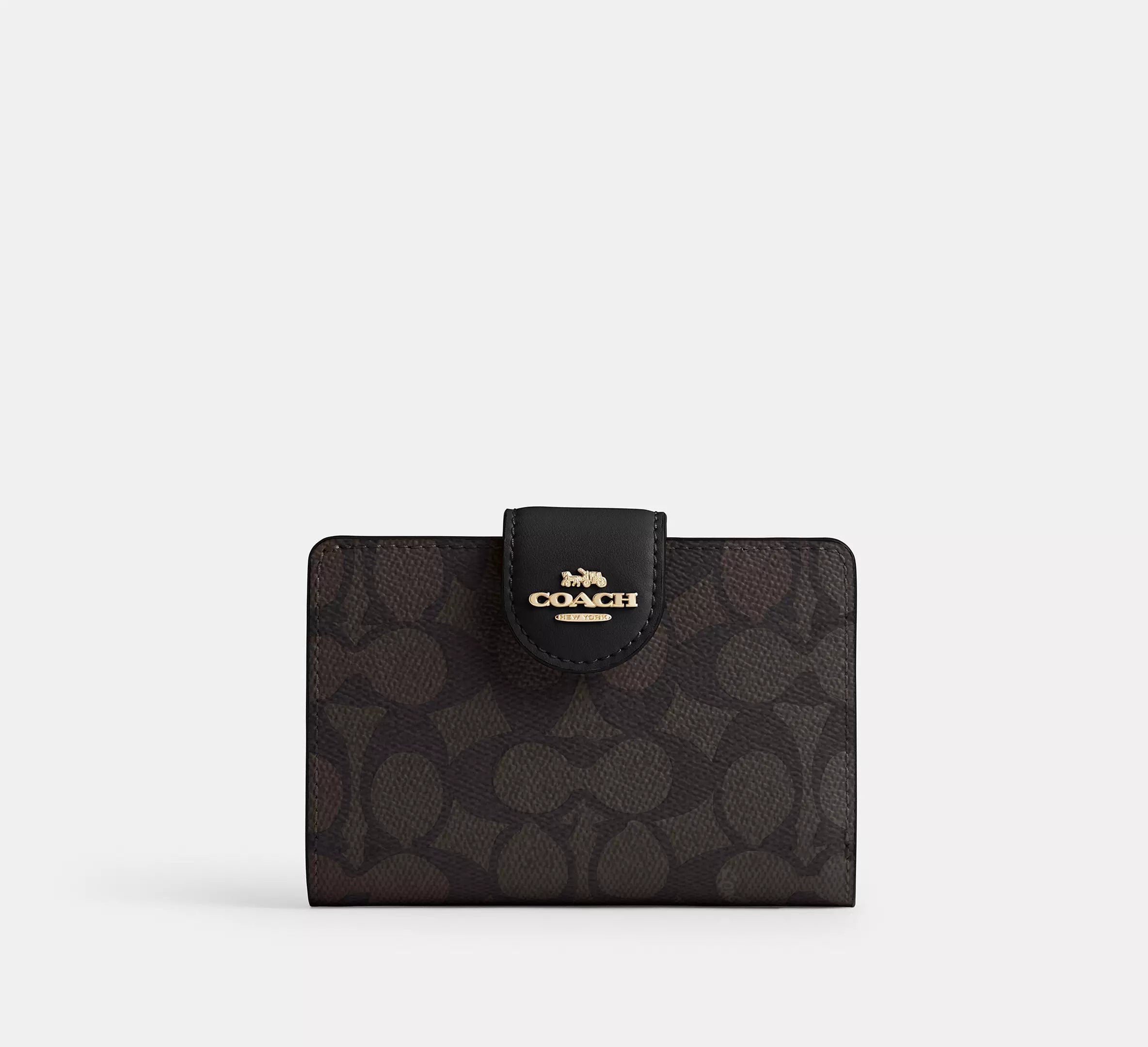Cartera mediana con cremallera en las esquinas de Coach 