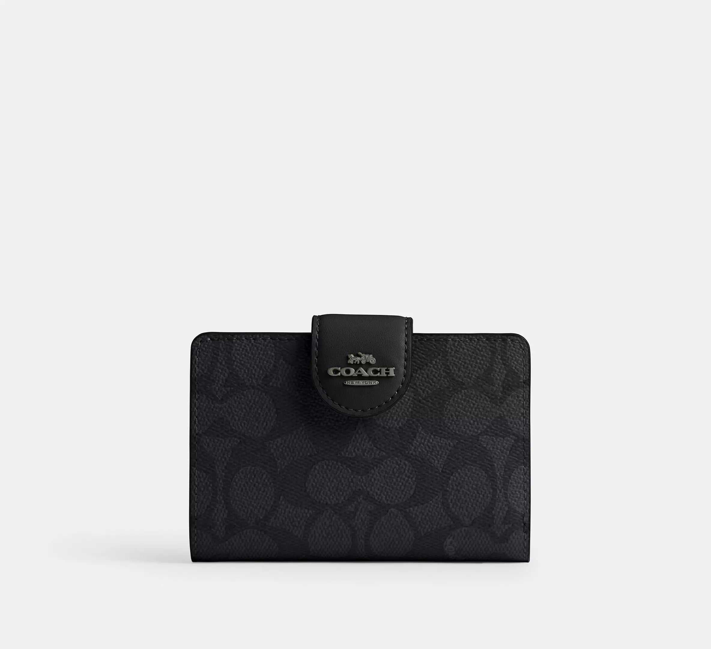 Cartera mediana con cremallera en las esquinas de Coach 