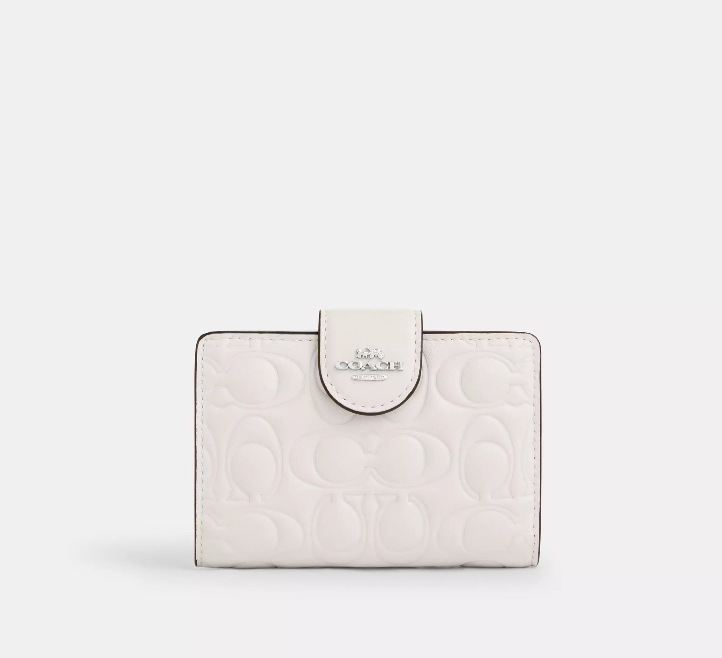 Cartera mediana con cremallera en las esquinas de Coach 